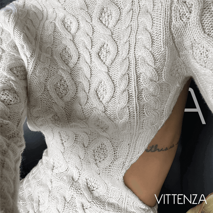 Detailed knit texture of the Abrazo dress with open-back cutout in nude white