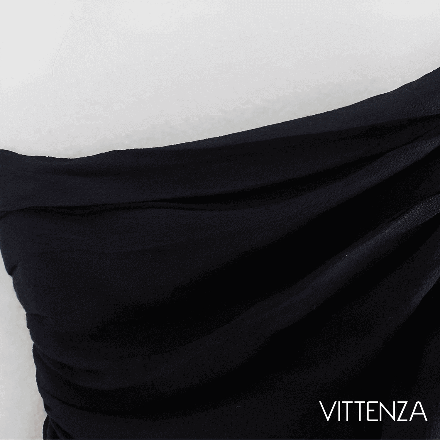 Close-up of the lightweight black fabric used in the Adcos Crop Top