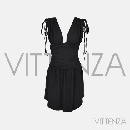 Front view of the black Artemis Dress, showcasing its sleek silhouette, ruched waist, and adjustable tie-up straps.