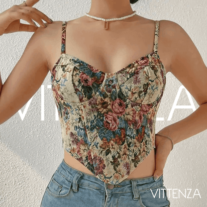 Front view of the Artistic Printed Corset Top featuring a vintage-inspired floral pattern, adjustable straps, and flattering corset design, paired with denim jeans.