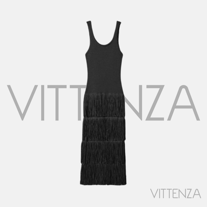 Flat-lay of the Bahamas dress in black with layered fringe.