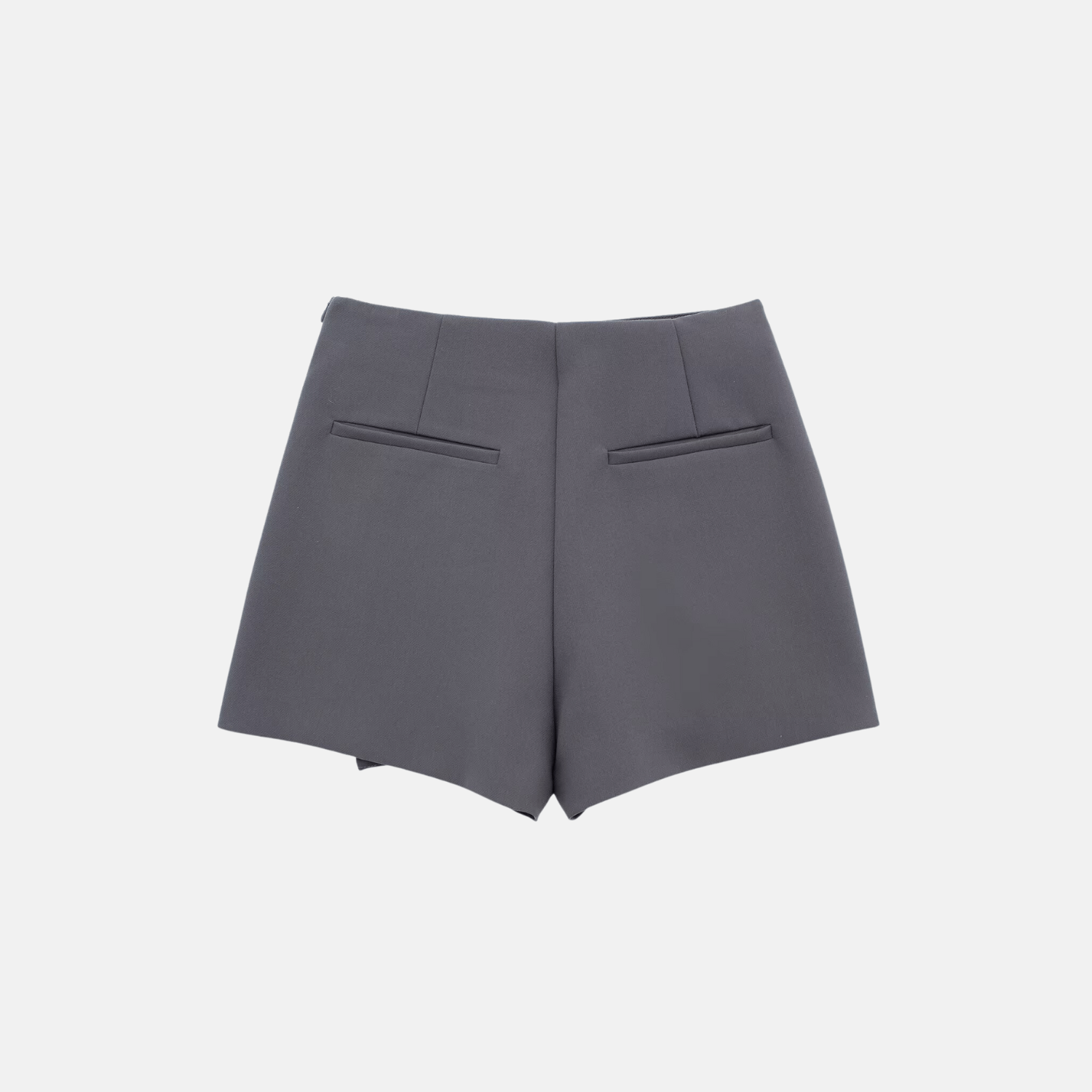 Back view of the gray Barbie Shorts Skirt in flat lay, showcasing the back pockets and tailored design.