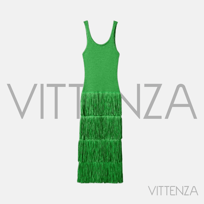 Flat-lay of the Bahamas dress in green with layered fringe.