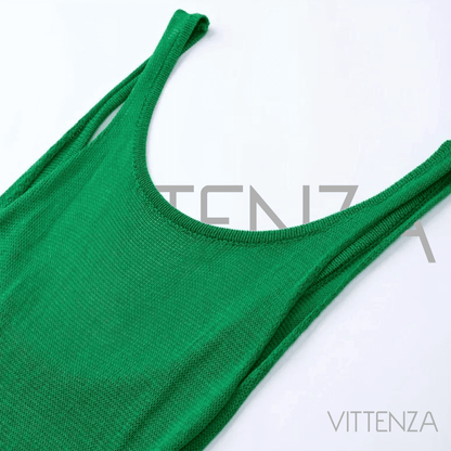 Upper section of the green Bahamas dress, showing the scoop neckline and knit fabric.