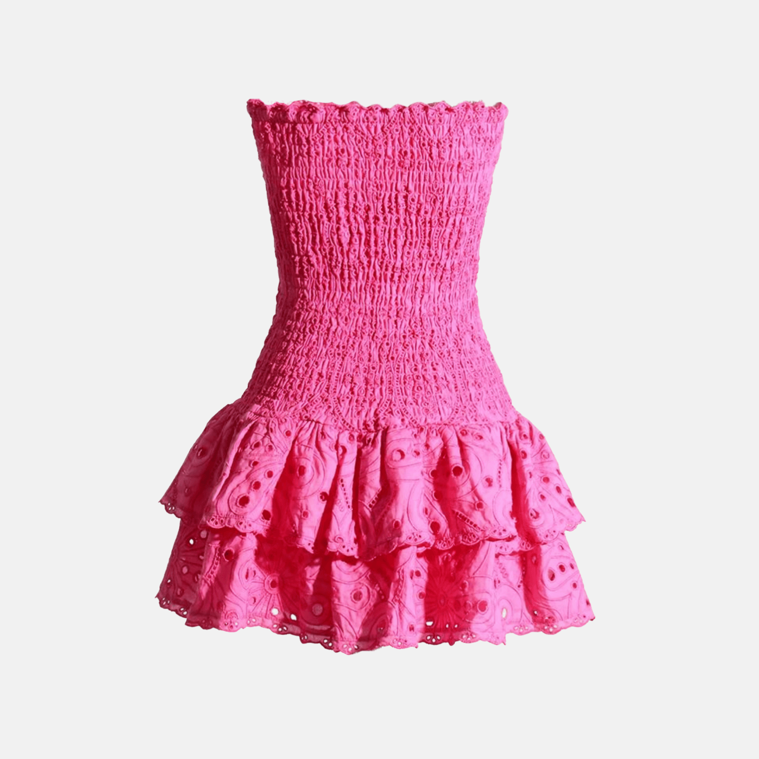 Flat lay view of the Gummy Dress highlighting its strapless elastic bodice, tiered ruffled hem, and intricate embroidery in vibrant pink.