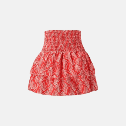 Orange patterned high-waisted ruffle skirt front view.