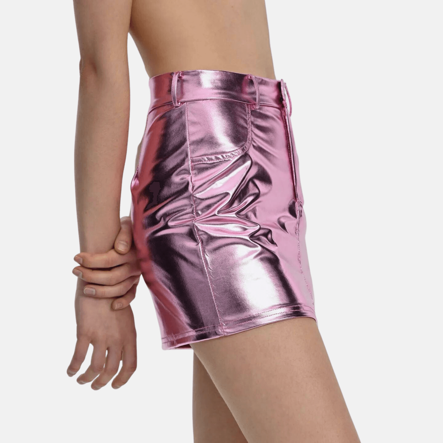 Side view of a pink metallic high-waisted skirt, highlighting the reflective fabric, side pocket detail, and sleek fit.