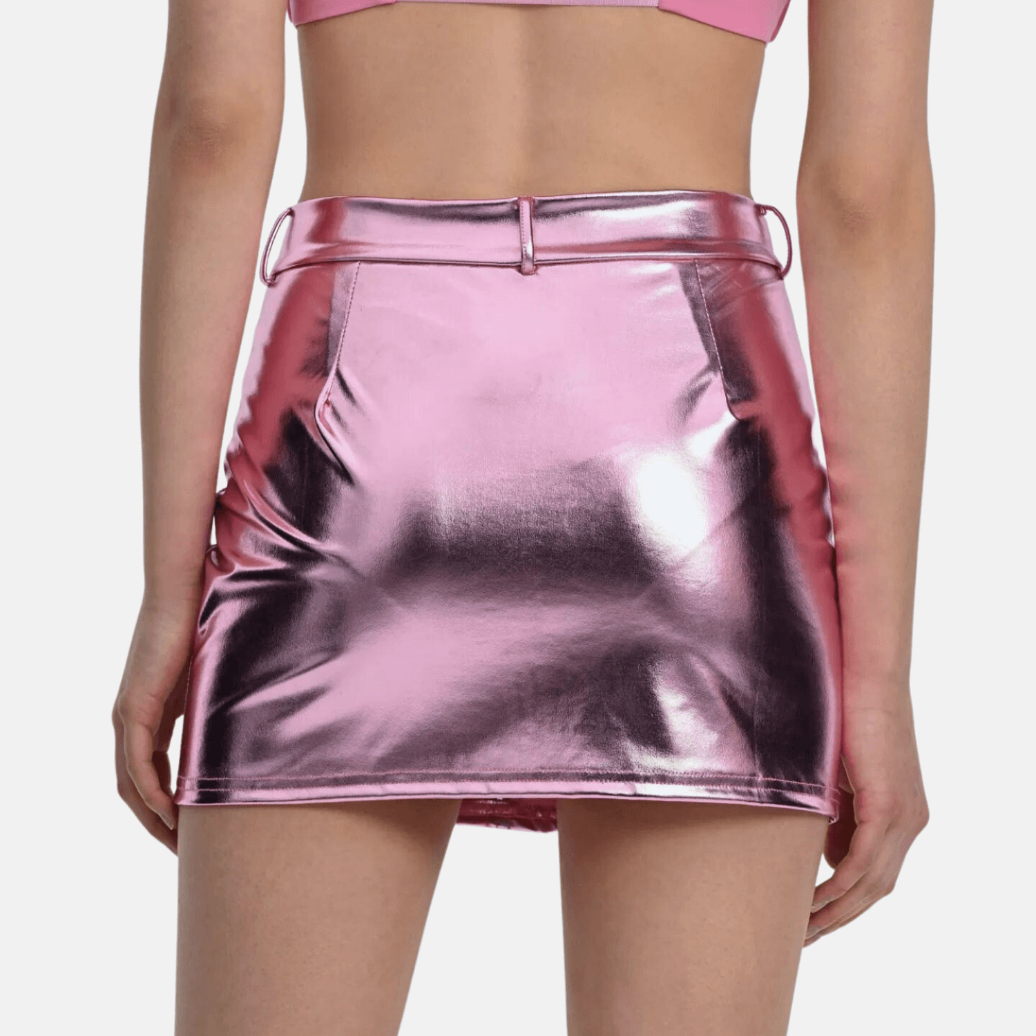 Back view of a pink metallic high-waisted skirt, showcasing the sleek, reflective finish and subtle stitching details.