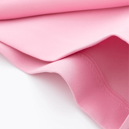 Close-up of the hem stitching on the pink Barbie Shorts Skirt, highlighting its durable craftsmanship.