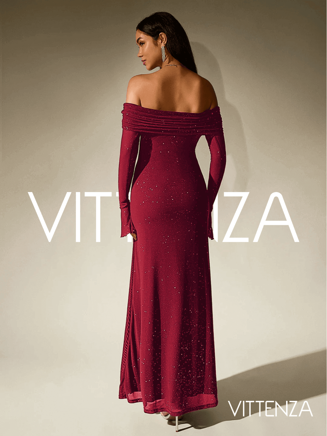 Back view of the Stellar Sparkle Maxi Dress in shimmering red. Showcases the off-shoulder design, long sleeves, and a flattering floor-length silhouette. The model accessorizes with statement earrings and subtle jewelry.