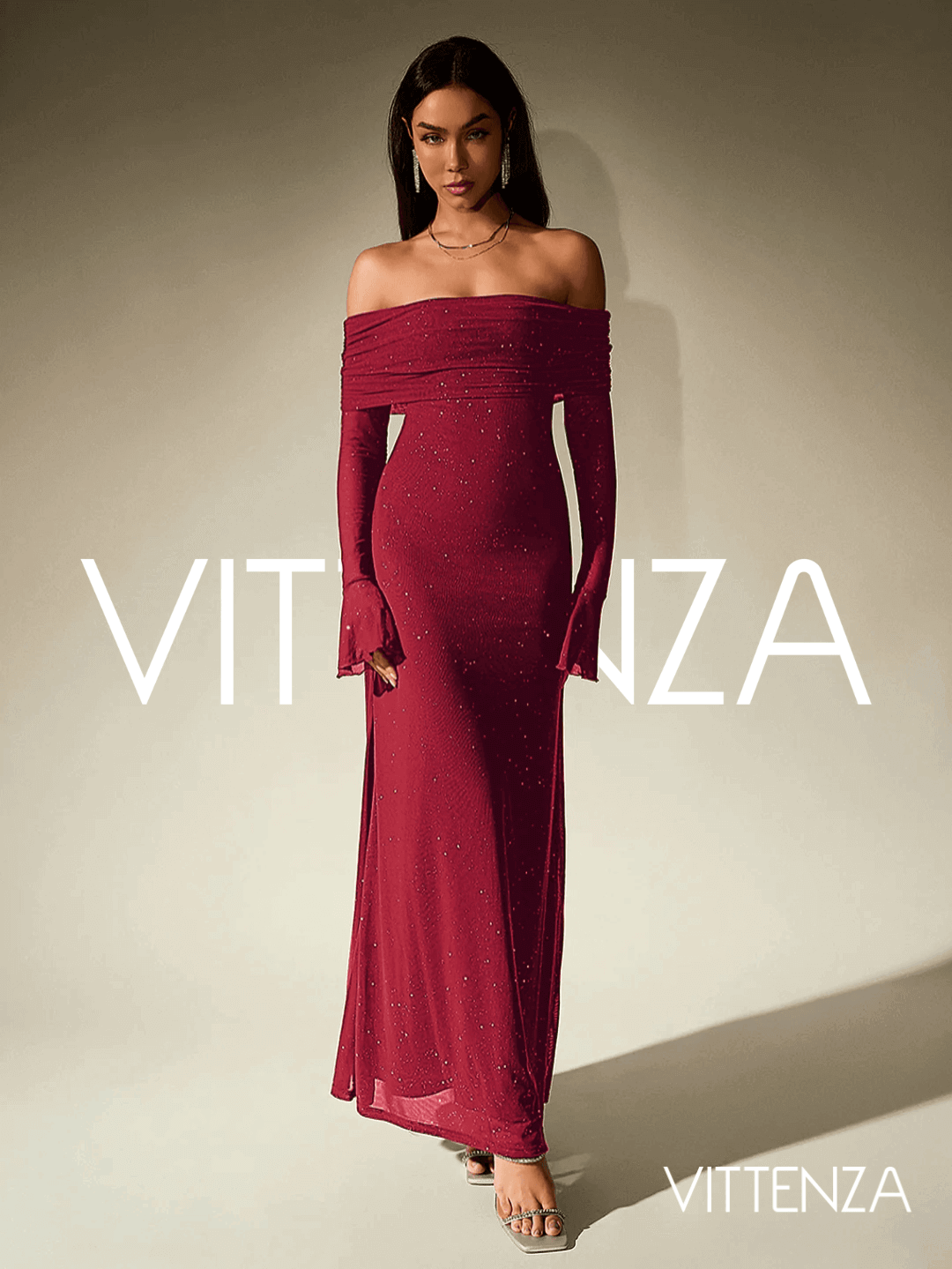 Front view of the Stellar Sparkle Maxi Dress in shimmering red. The dress features an off-shoulder design, glittering fabric, and an elegant floor-length silhouette. The model accessorizes with metallic heels and delicate jewelry.